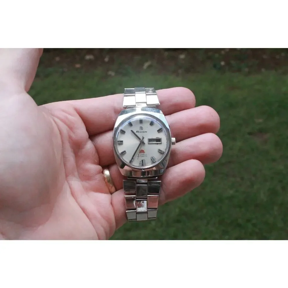 Vintage 1976 Ricoh Automatic Mens Silver Watch W/daydate & Red accents